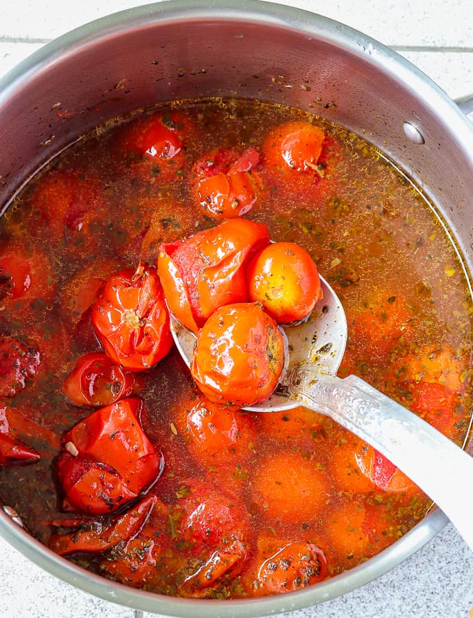 herbs & garlic homemade made tomato soup cooking