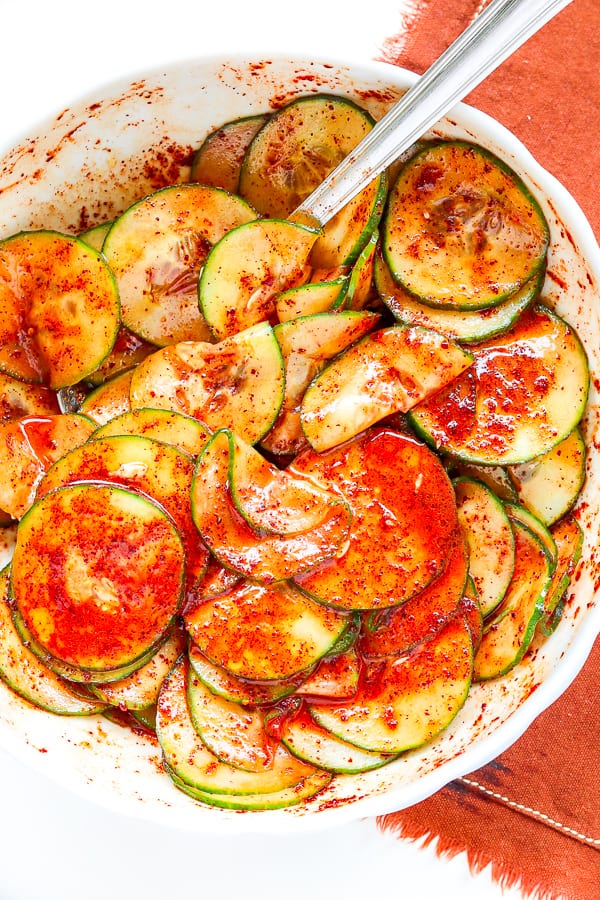spiced marinating cucumber in a bowl
