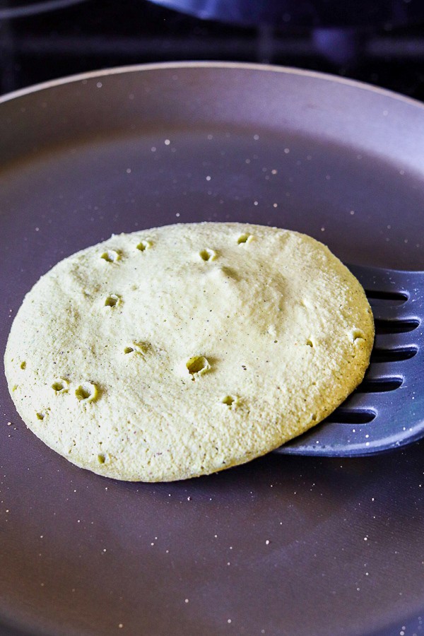 spatula flipping zucchini pancake