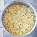 Cooked quinoa in a saucepan