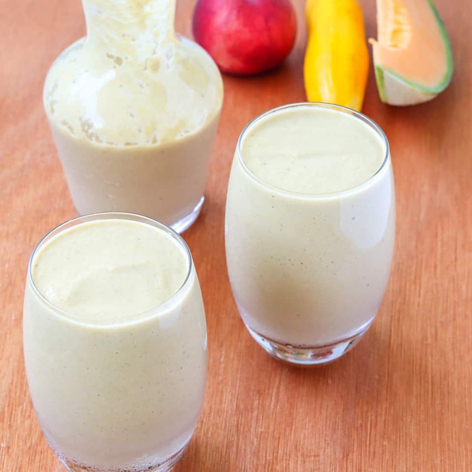 fresh peach smoothie with summer fruits