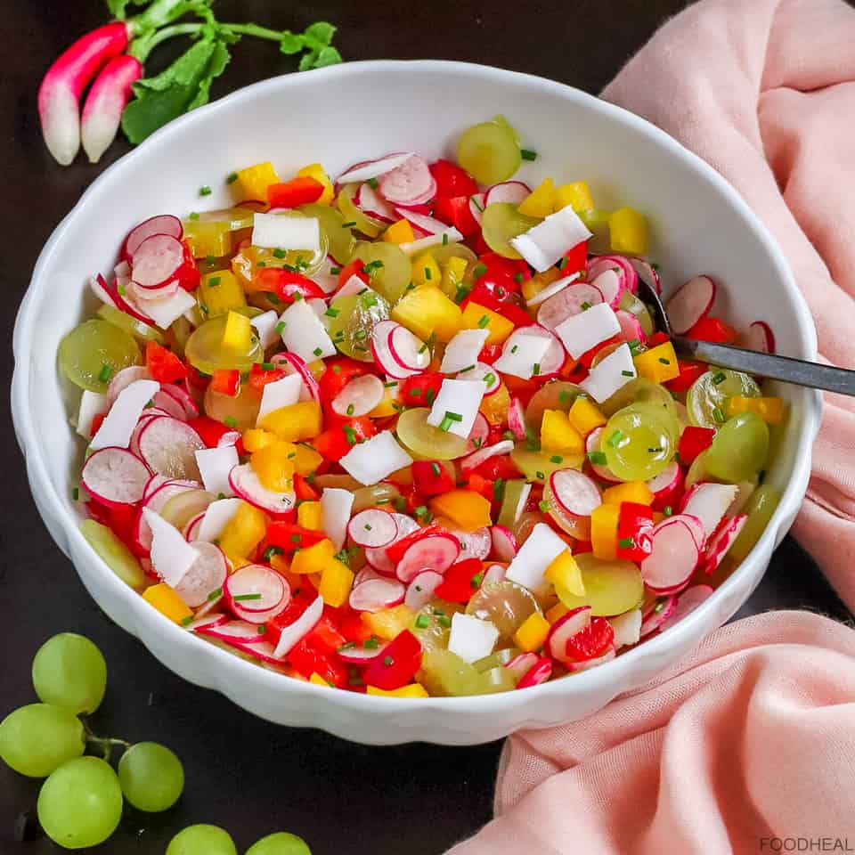 Radish, grapes, bell peppers & fresh coconut diced in a bowl