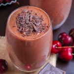 Delicious cherry chocolate smoothie topped with dark chocolate