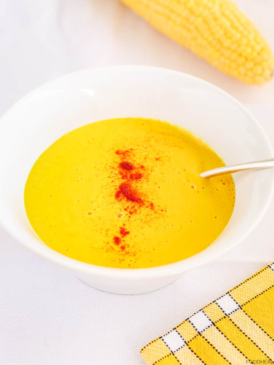 corn butternut soup in a white bowl